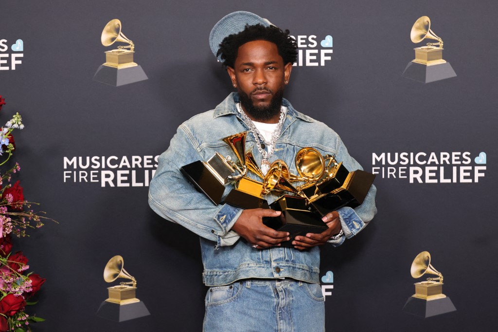 LOS ANGELES, CALIFORNIA - FEBRUARY 02: Kendrick Lamar, winner of the Record of the Year, Best Rap Performance, Best Rap Song, Best Music Video, and Song of the Year Awards for 