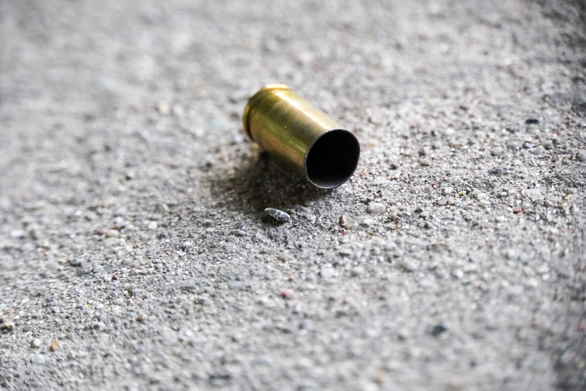 Elementos de seguridad en el lugar del homicidio en Singuilucan