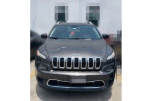 La camioneta Jeep interceptada por agentes investigadores presuntamente participaba en un intercambio de paquetes cuando ocurrió la movilización policial